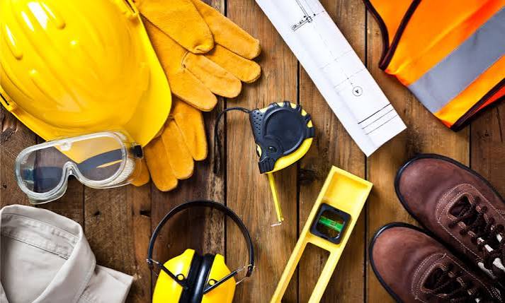 Personal protective equipment including hard hat, gloves and safety glasses